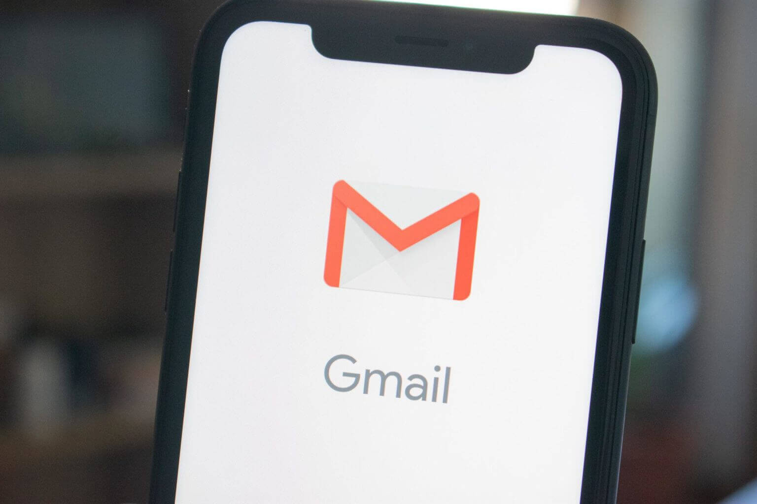 Gmail Logo on iPhone Real Estate Email Marketing