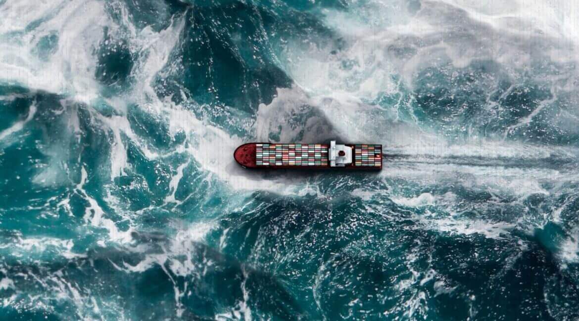 Photograph of a ship at stormy sea